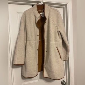 Brown and white coat